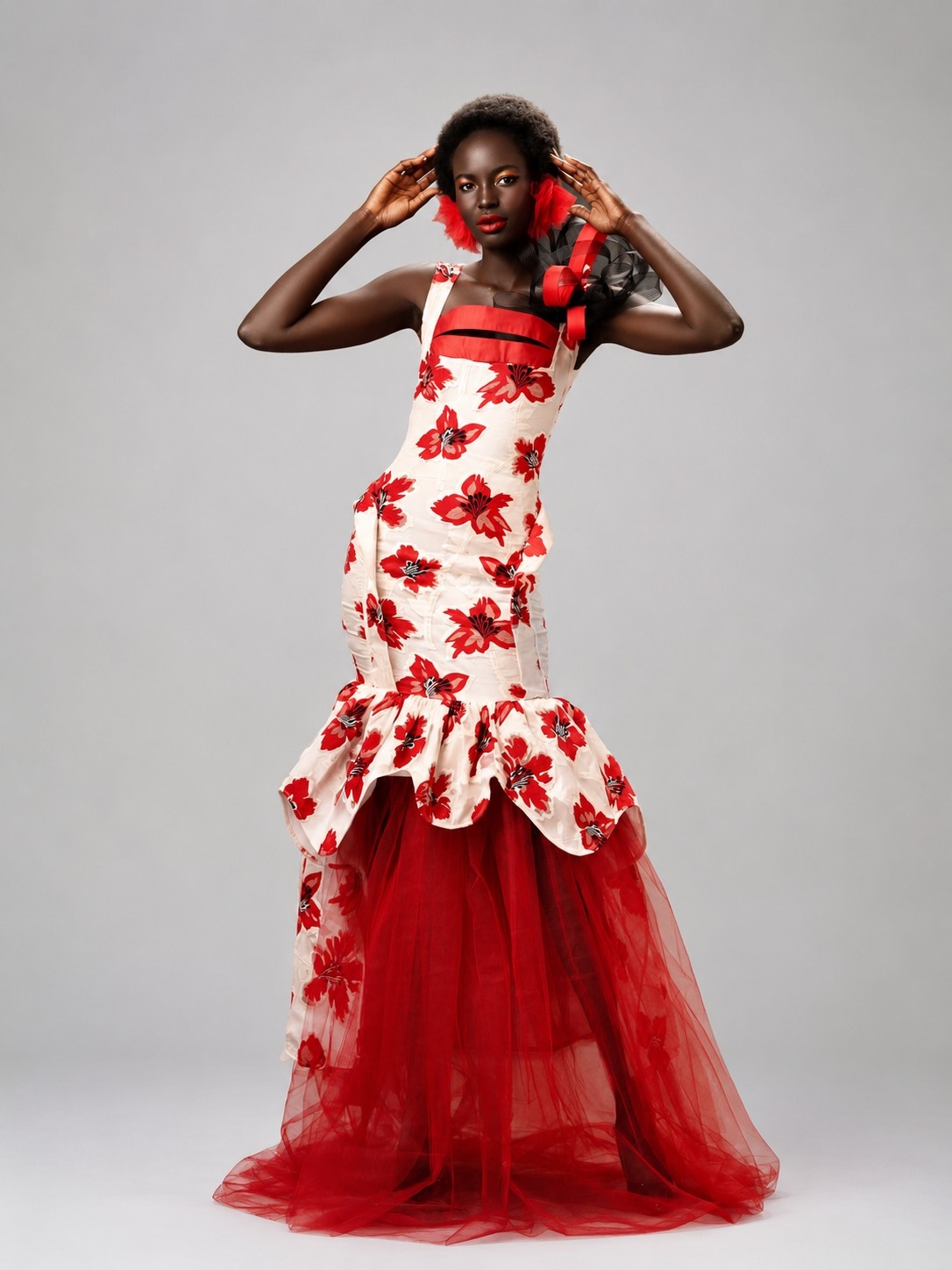 Model wearing the Crimson Bloom look in a full-length editorial portrait